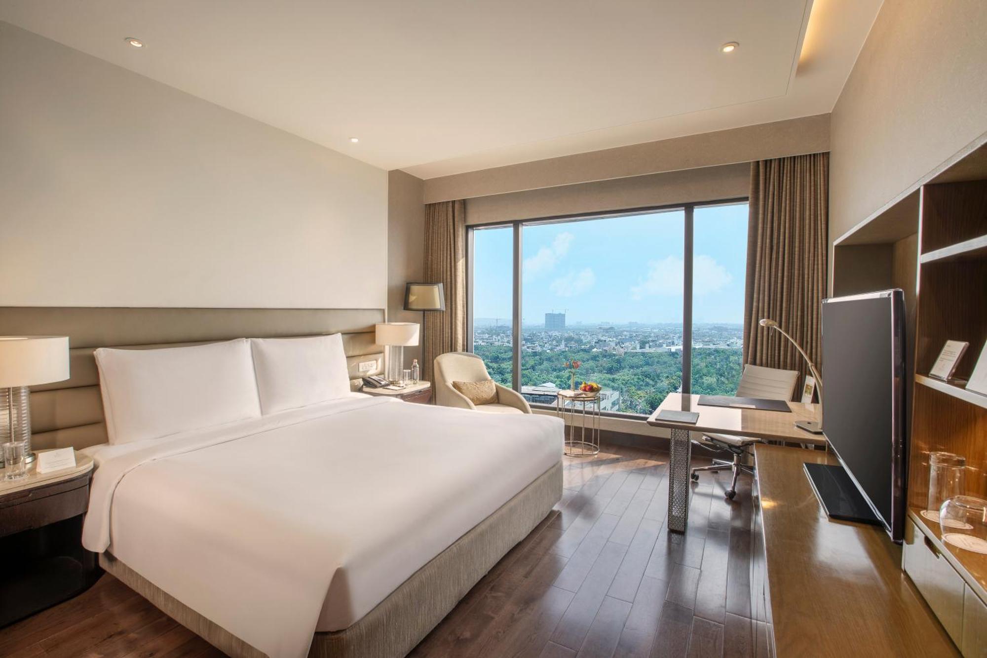 The Leela Ambience Convention Hotel Delhi New Delhi Exterior photo A room at the hotel